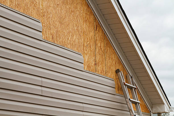 Professional Vinyl Siding technician working in Bay Village, OH